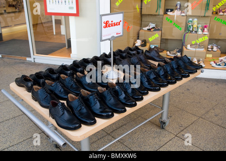Shoes on sale at a stall Berlin Germany Stock Photo