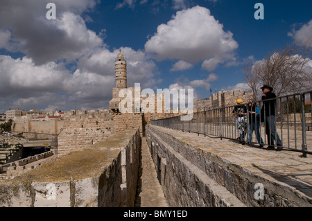 View across upper sentry path of the Ottoman walls toward Tower of David or Jerusalem Citadel at the western edge of the old city in Jerusalem Israel Stock Photo