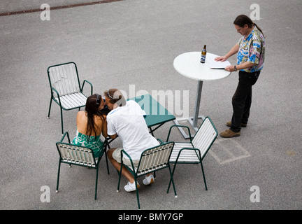 A couple and a stranger Stock Photo
