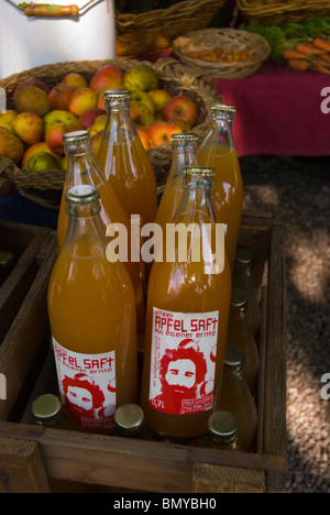 Organic independently sold apple juice Mauerpark flea market Mitte central Berlin Germany Eurore Stock Photo