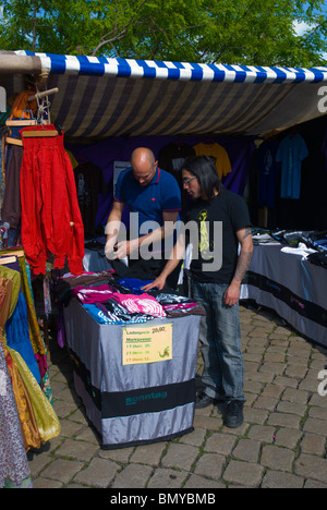 Clothes stall Mauerpark flea market Mitte central Berlin Germany Eurore Stock Photo