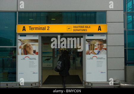 Person walking into Schengen Terminal Ryzune airport Prague Czech Republic Europe Stock Photo