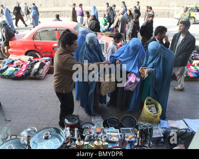 Afghan women and girls wearing a burqa in Kabul Stock Photo