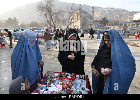 Afghan women and girls wearing a burqa in Kabul Stock Photo