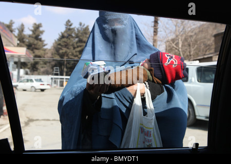 Afghan women and girls wearing a burqa in Kabul Stock Photo