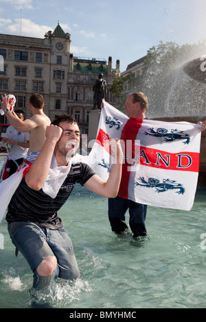 Football World Cup 2010, England Fans celebrate win over Slovenia in Trafalgar Square, London Stock Photo