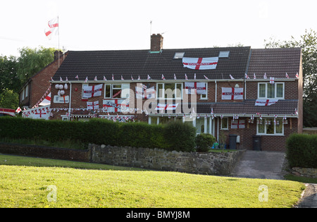 Houses in Stoke-on-Trent decorated with England flags and bunting supporting the England football team Stock Photo