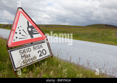 Skid Risk sign on a newly resurfaced road in the Scottish Borders. Stock Photo