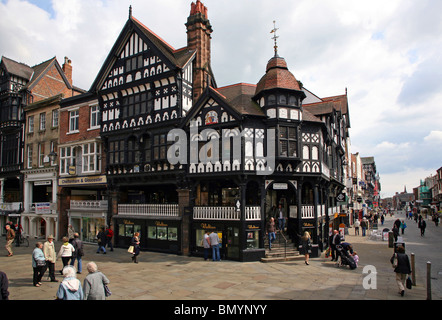 View of The Rows on the corner of Bridge Street and Eastgate Street in the historic city of Chester Stock Photo