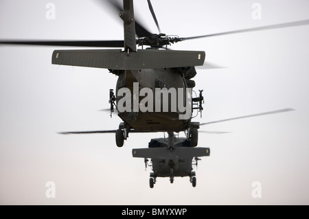 Two UH-60 Black Hawks underway on a mission over northern Iraq. Stock Photo