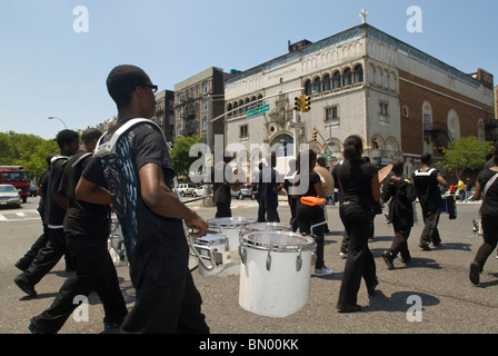 Marching band in the Juneteenth celebration parade through the streets of Harlem in New York Stock Photo