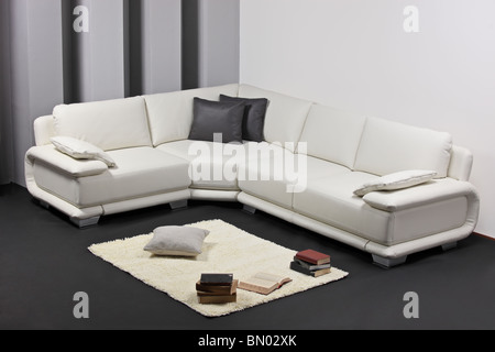 A modern minimalist living-room with white furniture Stock Photo