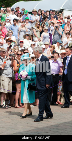 Britain's Queen Elizabeth II walks past tennis fans on Henman Hill on her first visit to Wimbledon Lawn Tennis Club for 33 years Stock Photo