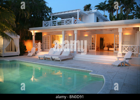 Back Yard of House with Pool at Dusk, Miami, Florida, USA Stock Photo