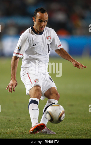Landon Donovan of the United States kicks the ball during a 2010 FIFA World Cup football match against Algeria June 23, 2010. Stock Photo