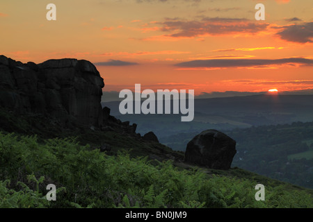 Sunset at the Cow & Calf rocks on Ilkley Moor, West Yorkshire, England Stock Photo