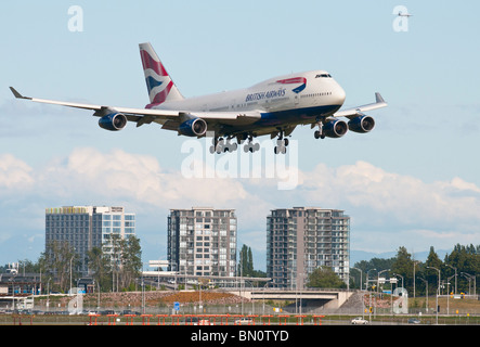 A British Airways Boeing 747-400 jet airliner on final approach for landing at Vancouver International Airport (YVR). Stock Photo