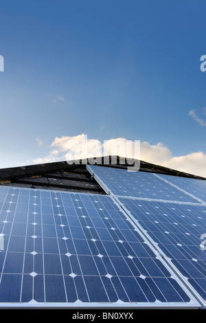 Solar Power. Photovoltaic cells on a domestic house roof in the UK Stock Photo