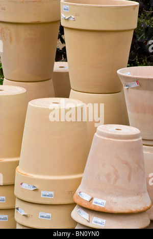 A stack of terracotta pots in the garden Stock Photo - Alamy