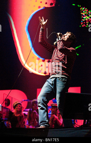 Damon Albarn co-creator of Gorillaz performing live on the Pyramid Stage at Glastonbury festival 2010 Stock Photo