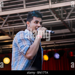 Popular new British Bhangra singer, Jaz Dhami, at the Glasgow Mela 2010 held in Kelvingrove Park. Stock Photo