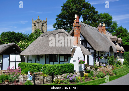 Thatched cottages and church tower, Welford-on-Avon, Warwickshire, England, United Kingdom Stock Photo