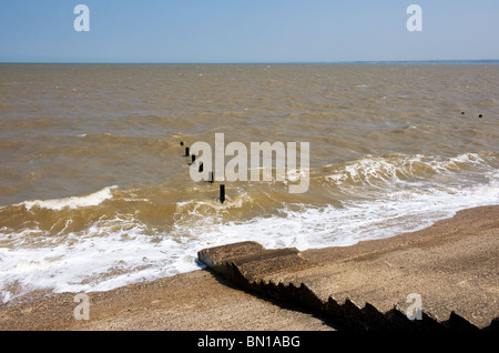 Steps leading down to the sea at Leysdown beach on the Isle of Sheppey in Kent.  Photo by Gordon Scammell Stock Photo