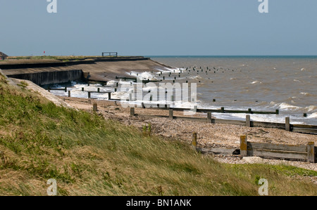 High tide at Leysdown Beach on the Isle of Sheppey in Kent. Stock Photo