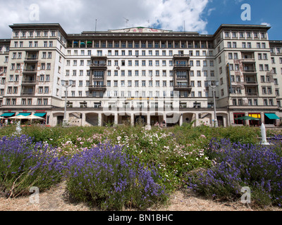 Large socialist era old apartment building on Karl Marx Allee in former East Berlin in Germany Stock Photo