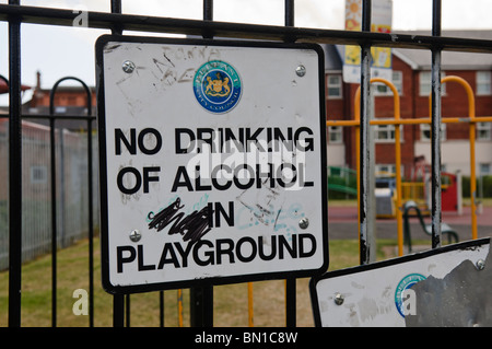 Sign on a Belfast playground banning the drinking of alcohol Stock Photo