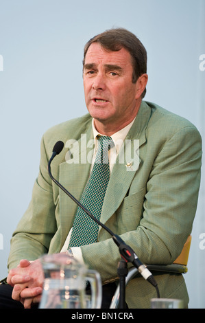 British racing driver Nigel Mansell pictured in conversation at Hay Festival 2010 Hay on Wye Powys Wales UK Stock Photo