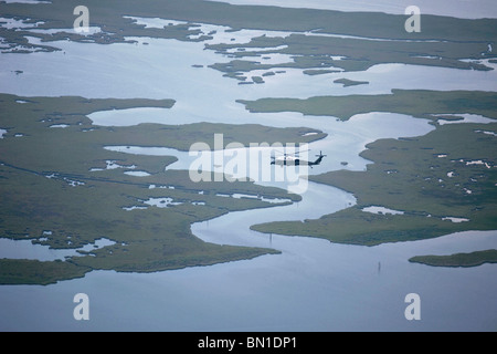 One of the Presidential helicopters flies over southern Louisiana as President Barack Obama returns to New Orleans. Stock Photo