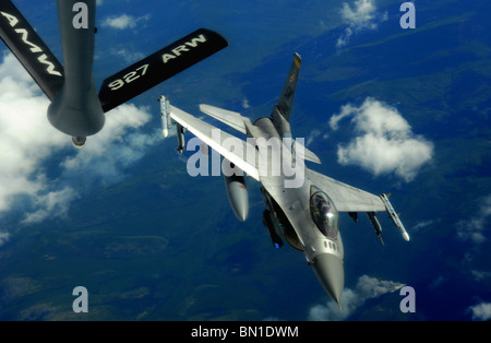 An F-16 Fighting Falcon pulls away after refueling from a KC-135 Stratotanker over Eielson Air Force Base, Alaska. Stock Photo
