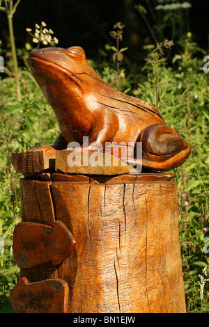 Frog Sculpture made from wood on local nature reserve Stock Photo