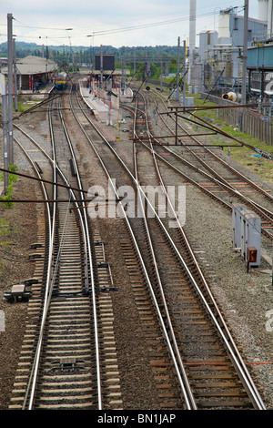 Converging railway tracks at Bank Quay station in Warrington. Stock Photo