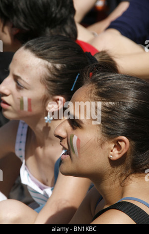 italian supporters watching italy v slovakia at world cup fan fest village in rome, italy 2010 Stock Photo