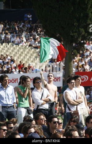 italian supporters watching italy v slovakia at world cup fan fest village in rome, italy 2010 Stock Photo