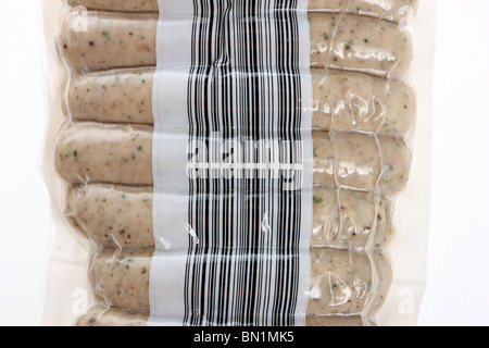 Sausages, packed in plastic. From a cooler in a supermarket. Computer bar-code. Stock Photo