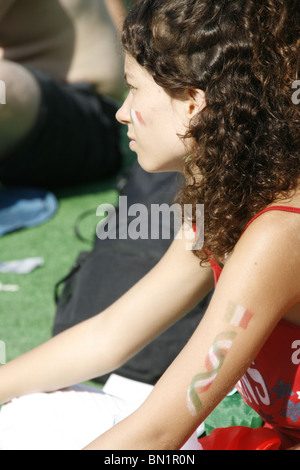 italian supporters watching italy v slovakia at world cup fan fest village in rome, italy 2010 Stock Photo