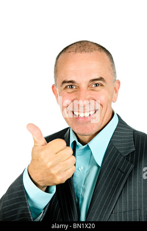 Portrait of smiling businessman giving thumbs-up isolated on white background Stock Photo