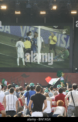 italian supporters watching italy v slovakia at world cup fan fest village in rome, italy 2010 Stock Photo