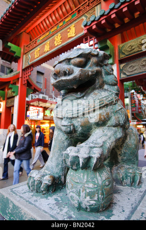 Guardian lion at the entrance to Chinatown, in typical Chinese style Stock Photo