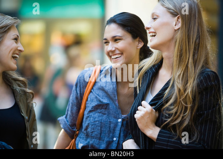 Friends laughing together Stock Photo
