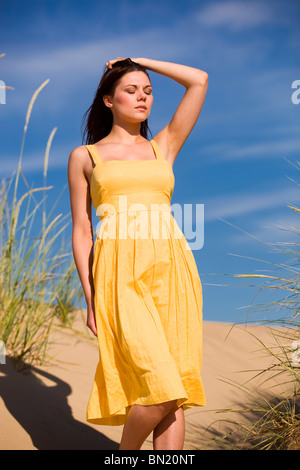 Girl sunbathing on nudist beach Stock Photo - Alamy