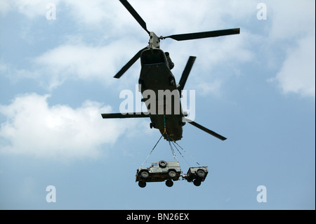 RAF Chinook HC.2 carrying an underslung Landrover and Trailer combo at the 2010, Biggin Hill International Air Fair Stock Photo