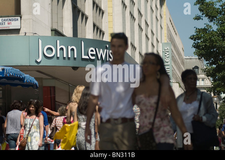 John Lewis department store London Oxford Street signage signs crowds of people shopping. 2010 2010s UK HOMER SYKES Stock Photo