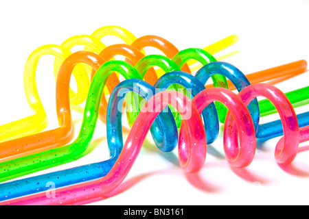 Five colored straws over white background Stock Photo