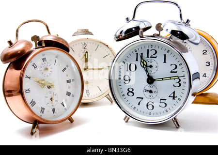 several alarm clocks over white background Stock Photo