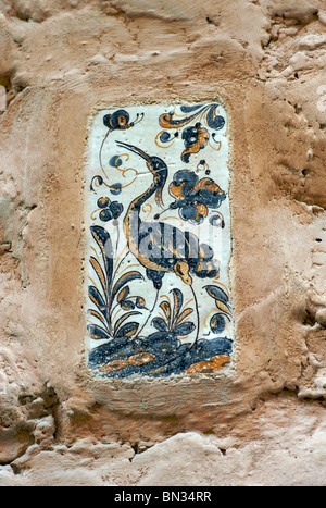 Stork motif ceramic tile on a building  Spain Stock Photo