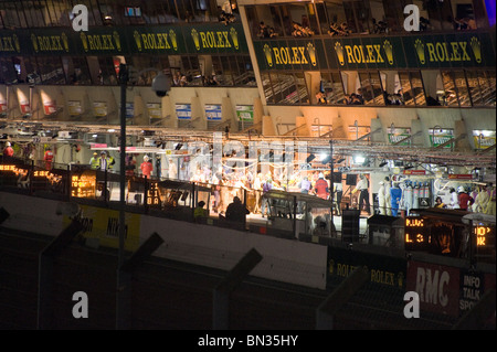 Spectators watching the pits at the 2010 Le Mans 24 hour race at night Stock Photo